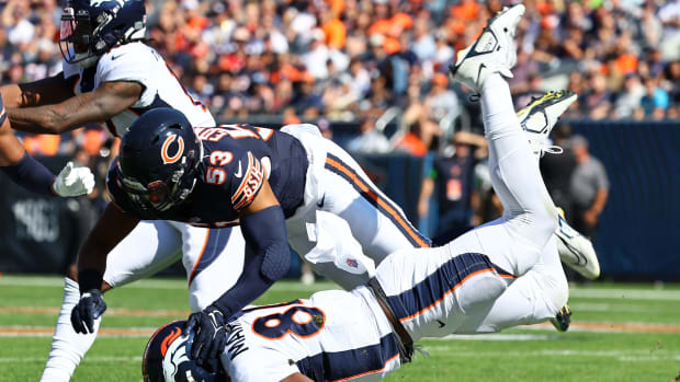 Denver Broncos tight end Chris Manhertz (84) makes attach against the Chicago Bears during the first half at Soldier Field.